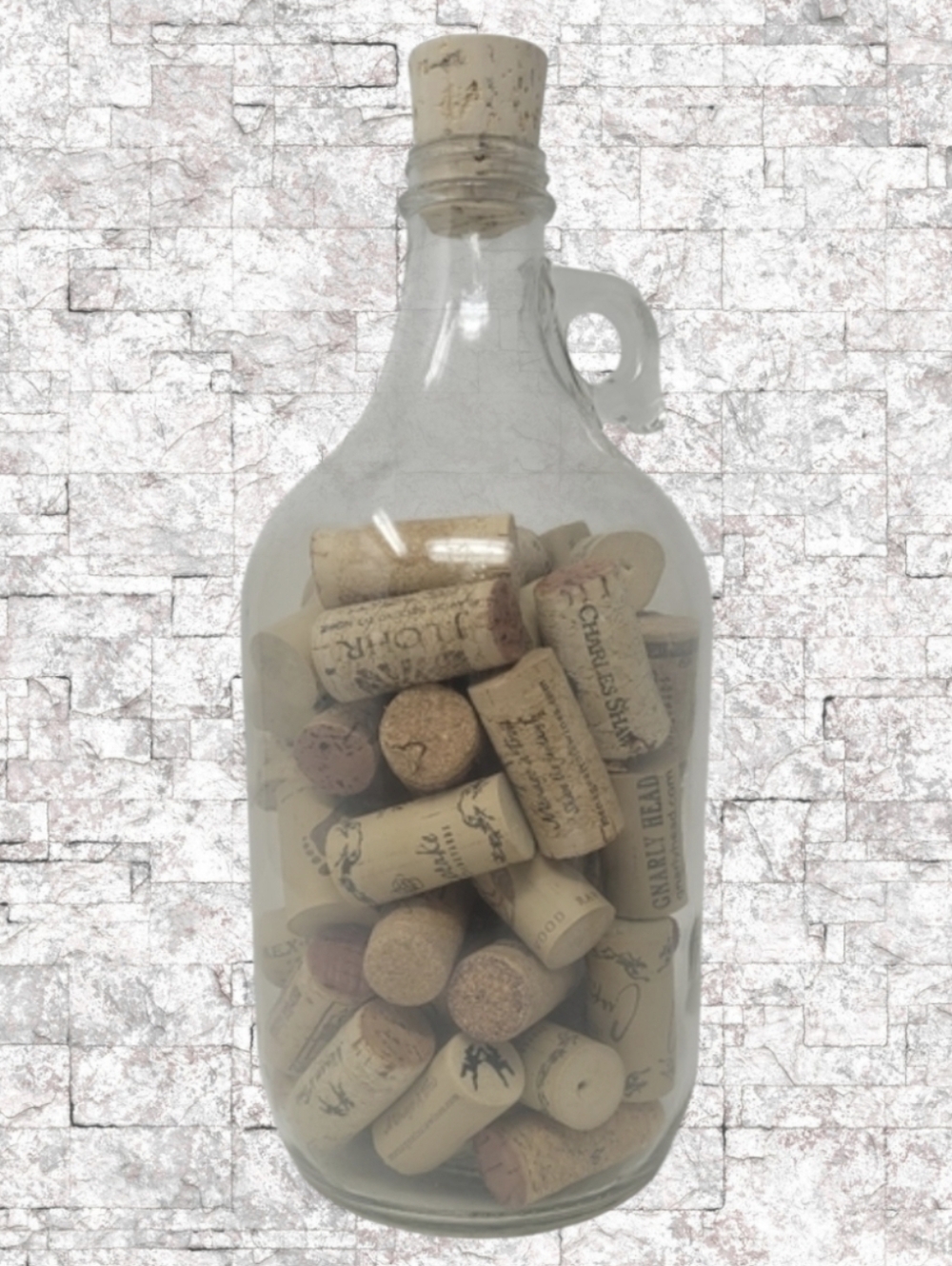 GLASS JAR OF WINE CORKS